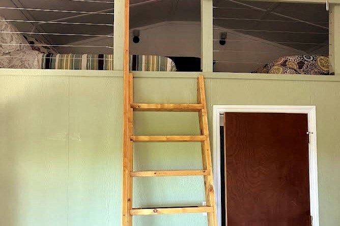 Ladder leading to loft.